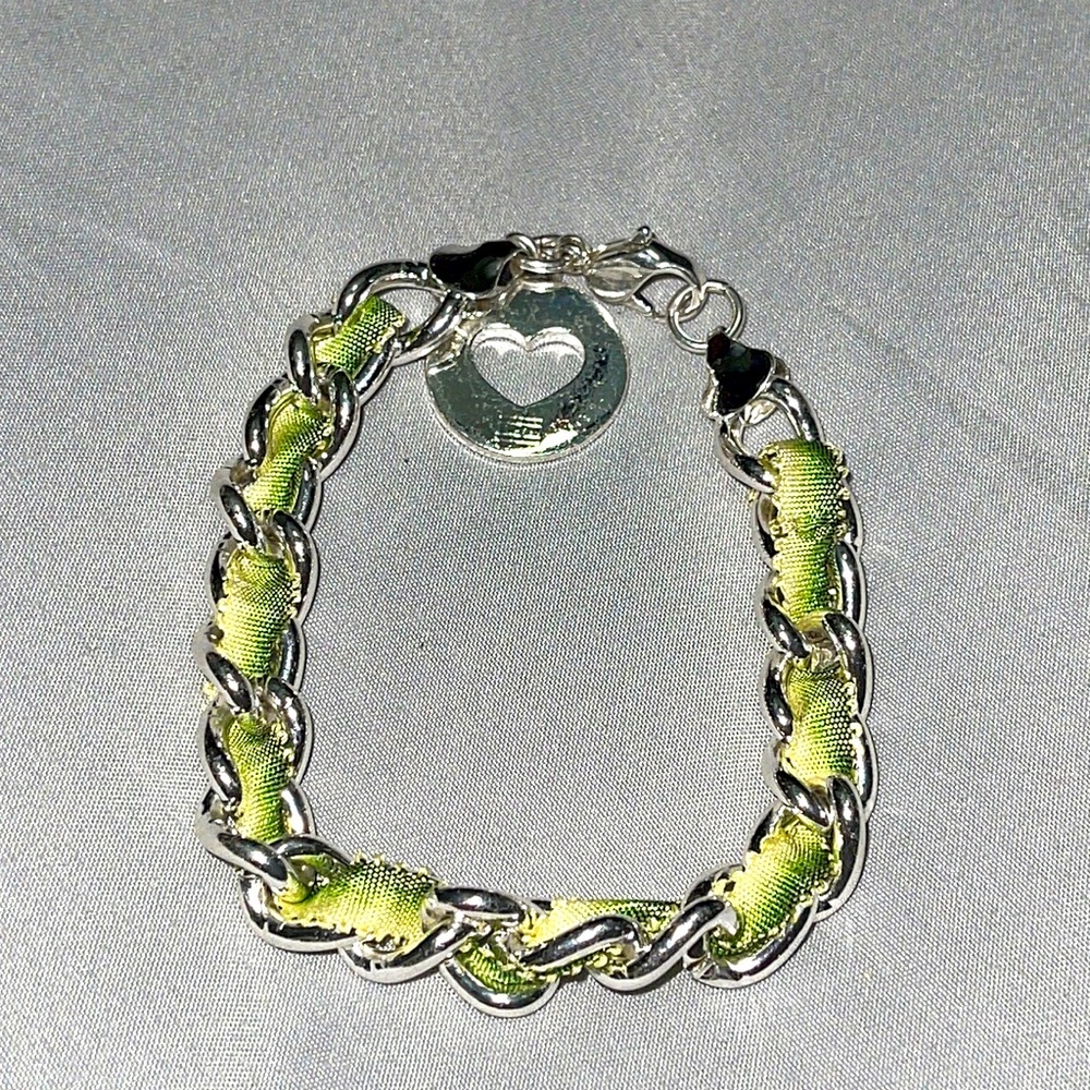 Tommy Hilfiger silver and green bracelet with heart charm